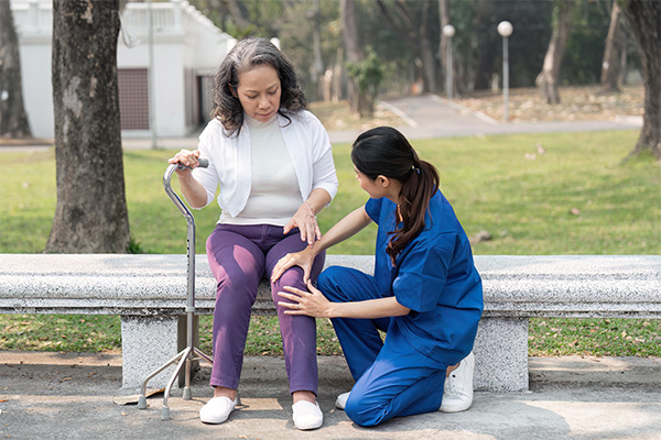 Care specialist assisting a Veteran at home
