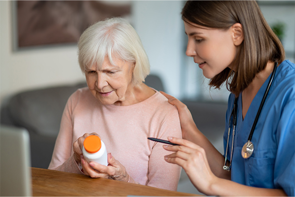 Care specialist assisting a Veteran at home