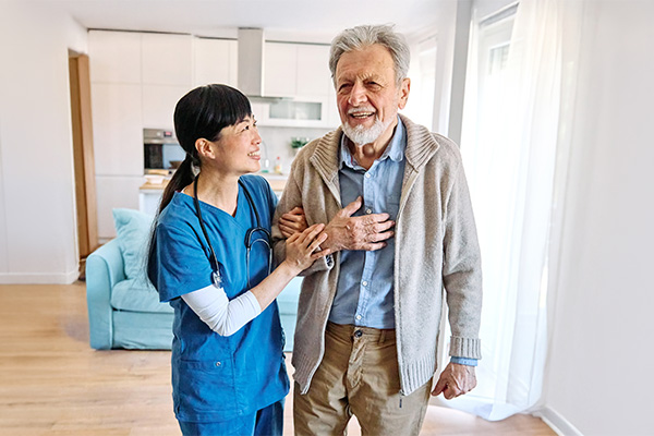 Care specialist assisting a Veteran at home