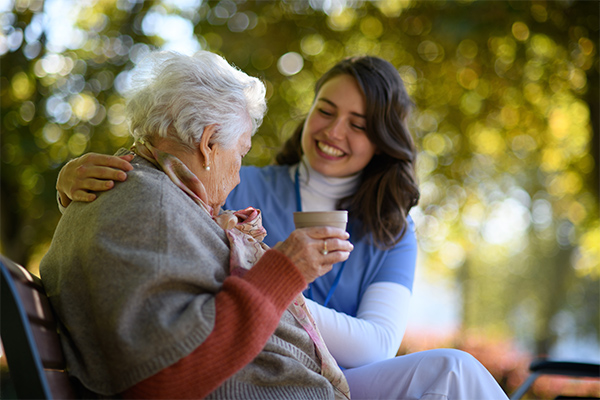 Care specialist assisting a Veteran at home