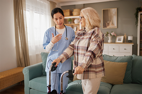 Care specialist assisting a Veteran at home